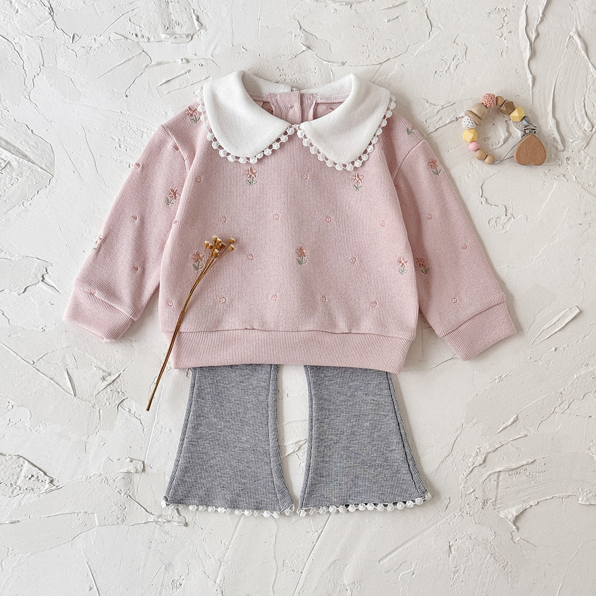 Floral doll collar long sleeved top+solid color flared pants lace hem two-piece set
